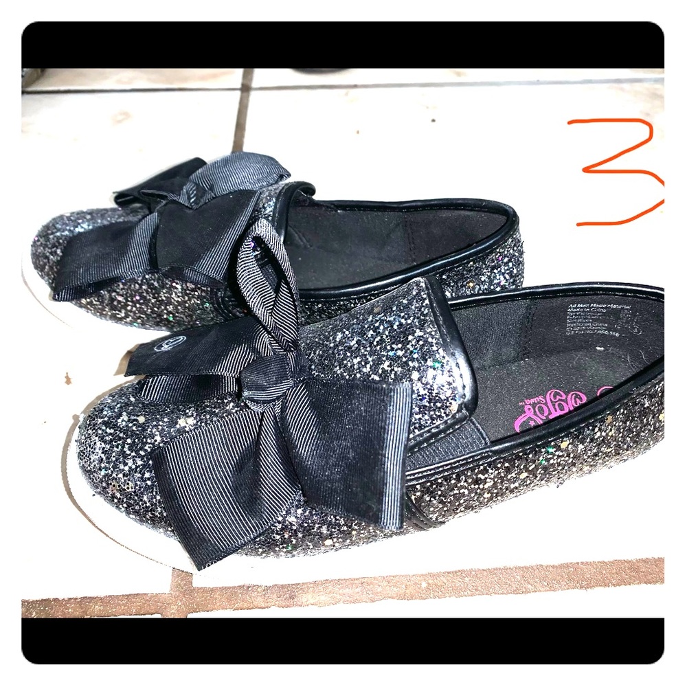 Jojo Siwa slip-on shoes.